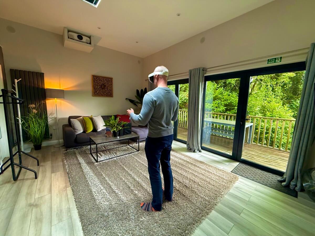 Guest wearing VR headset in cubes