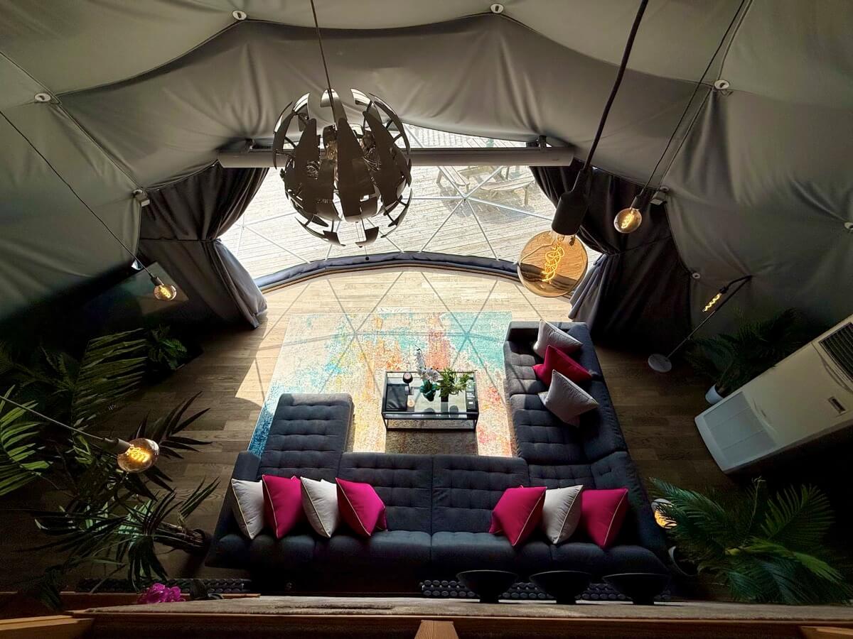 Stylish lounge from above, showcasing layout and lighting