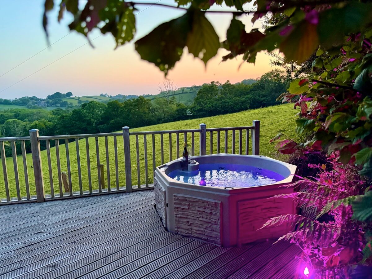 Sunset countryside view from the hot tub on the decking