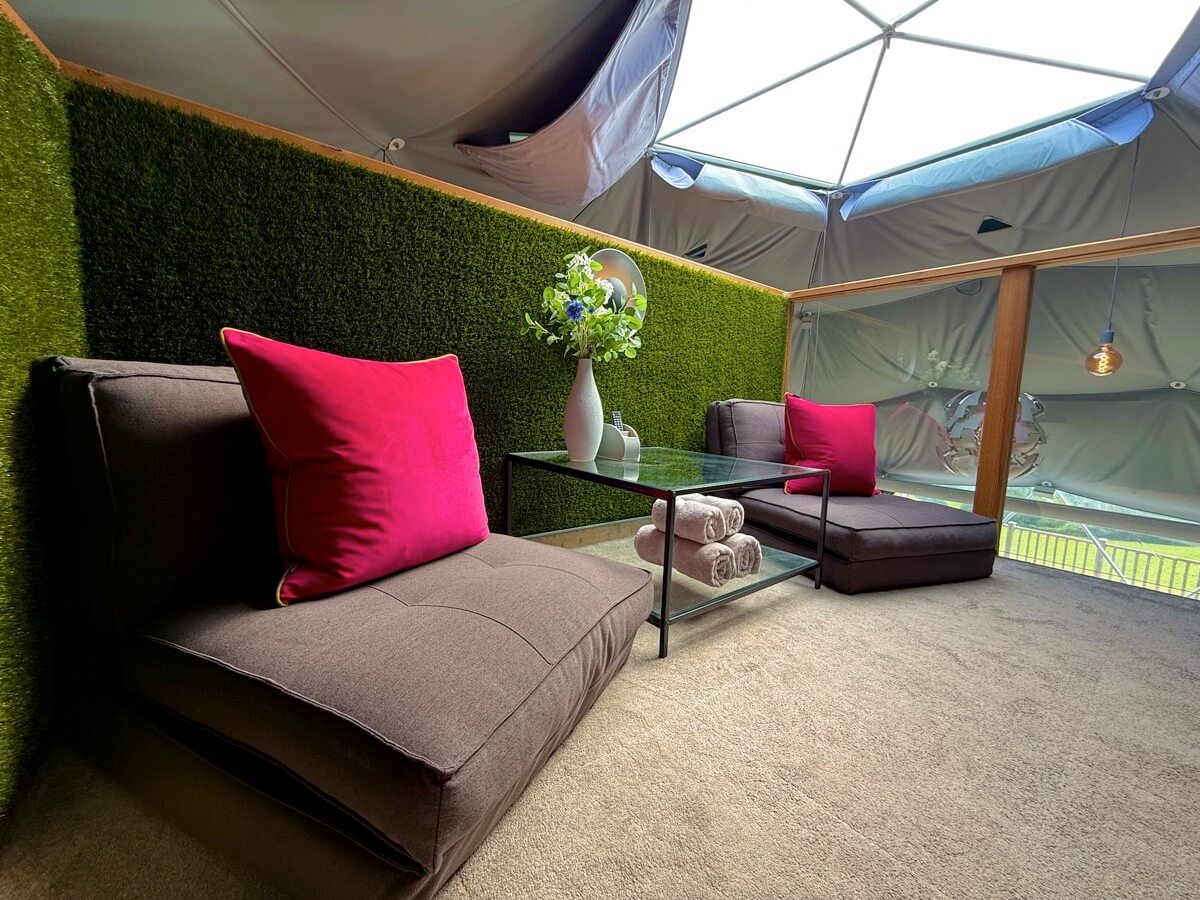 Chill-out corner under the dome skylight with soft seating