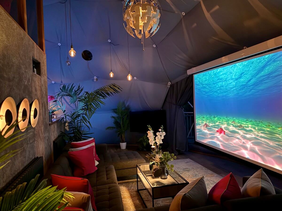 Evening cinema setup with vibrant underwater projection