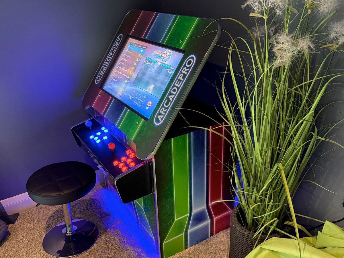 Retro arcade machine with gaming stool.