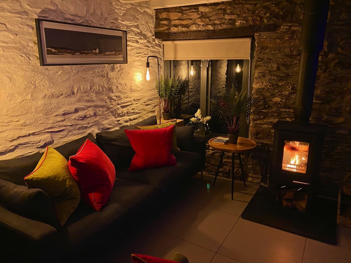 Relaxing ambiance with log burner in Sunridge Lodge