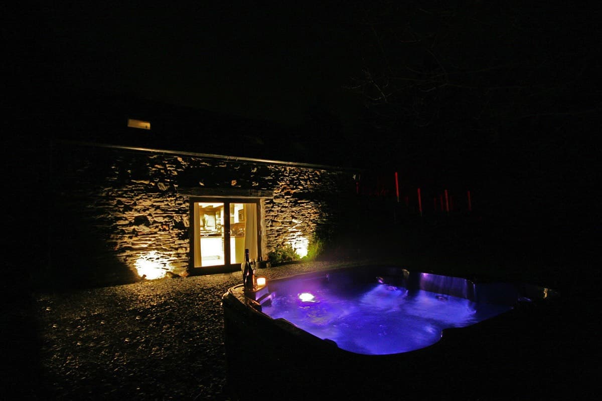 sunridge lodge hot tub at night all lit up